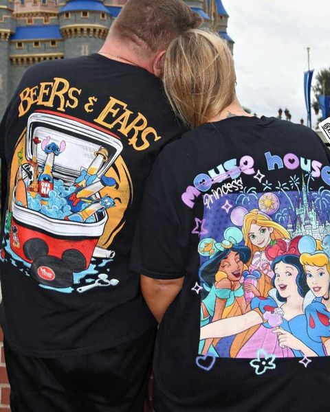 Someone wearing a Mouse House design in a theme park