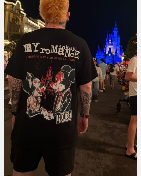Someone wearing a Mouse House design in a theme park